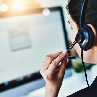 Woman on headset answering calls