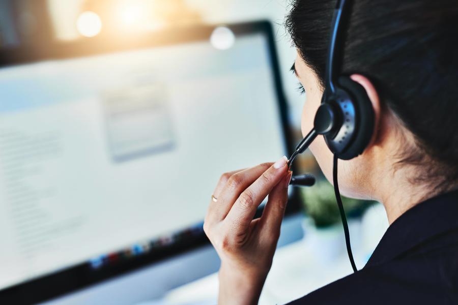 Woman on headset answering calls