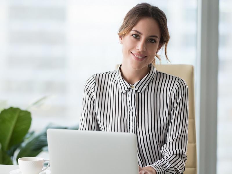 Woman working at computer.